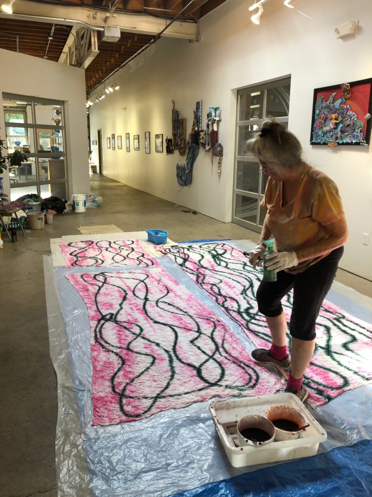 Flex space for artist Candy Kuehn renting the HUB to create large fabric design for commission